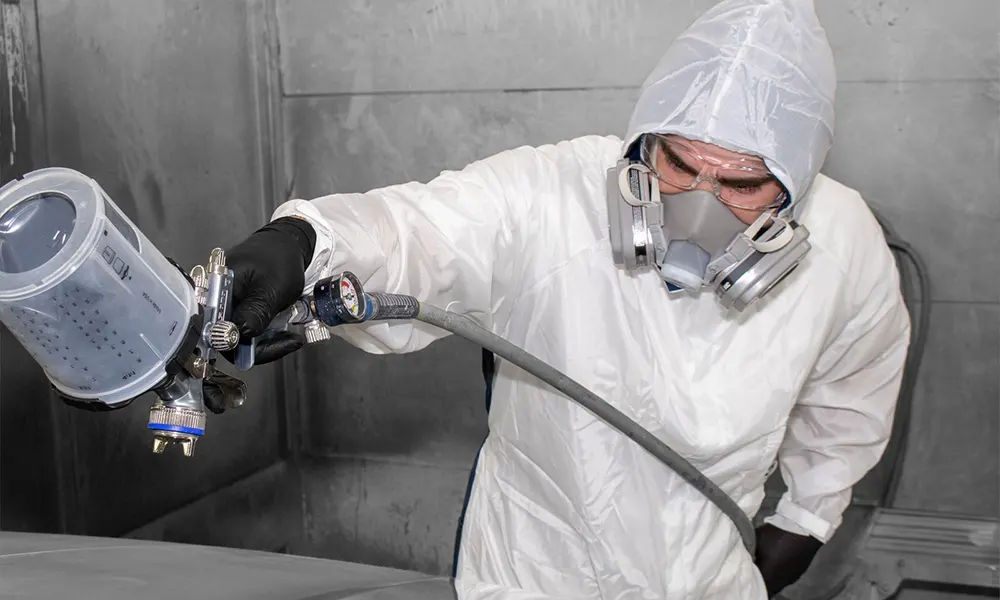 Auto body refinishing process in a paint booth