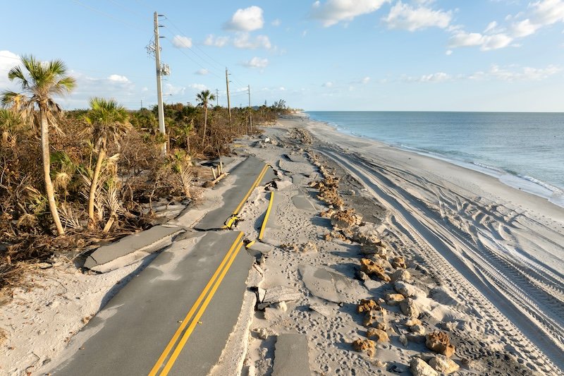Hurricane storm surge destroyed waterfront road on ocean shore in Florida. Severe damage to transportation infrastructure. SSUCv3H4sIAAAAAAAACoxTTY/bIBC9V+p/iDivJT5sbPcf9NBbb6sexkAStNhYgLeqovz3gh0cEnW1lXzwvPl682a4fP1yOKABvBbo2+GSrGhrYxYfHARtpwjjlxvu1CSVK5F3xzguAdClpaQO1mkwJThAEOcJRhXBaTEmwdfViXyAsHjlCy7SKRh90Gs429sYGP+UAKHMHUtAqtl6HeazDTbVY0UbAUGdIq+HRlmE180+ZMfqjBnRhX46mPxsXdikeSki/DKkiB/aC2UMTMouHmX/1veDot8nmdROKv1/we3n167HSU0iCXK5FnM6ZRRscr5uoejtd1BuXOe+BcEitS10eLcCzLNioGdw8JA3Oy30dCoQG87rdeRKwi5TcIkVopTm4ZCxdobBpH0eYyeV8TN4HzNkxsuFRYHsWLSabFjHQltVJONGk0kY60nDm7YlpOaEthiVl3XWsc7KKHNcZmNBqtR0X83jzZG25j3mnLT7dvbzyz5a+PIl3nwdp3ff81GuMaSm3ar1/U7S8kcdwqe8GMYf9o6+nnzSm+Eo1T/namMy6/GN18MbteJNyw/fKGIdJnXbM7JvPNNCg46HbA1tcINxzeo94pkc6uL+4tfdQzK3uGt+5Fx1VVt3XVVT0VcDA1ypmqpW4qYXA1sfyo2wTiKijhHWKSUq2QhW1ZyqCiKNChTDx4E0IDiNWde/AAAA//8DAGxv3JsSBQAA