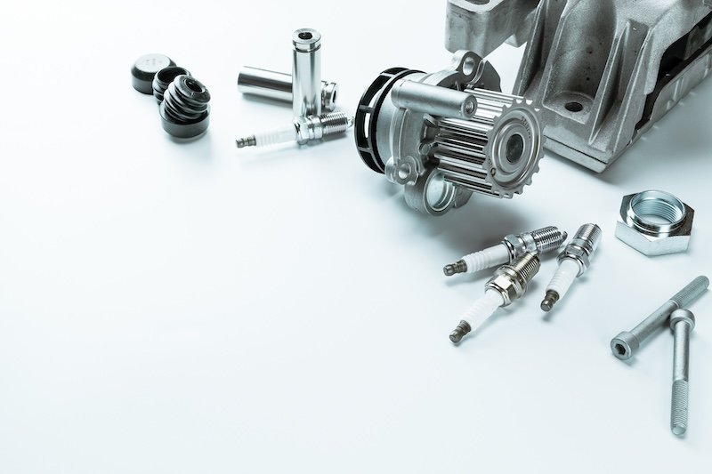 Car accessories. Set of new metal car part. Auto motor mechanic spare or automotive piece isolated on white background. Repair and vehicle service.